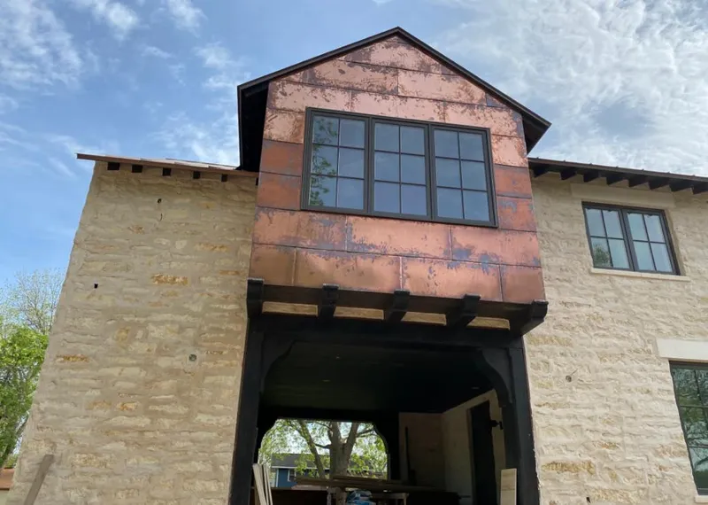 Copper metal panel facade on a stone building for Metal Roof Coating in Kaneohe
