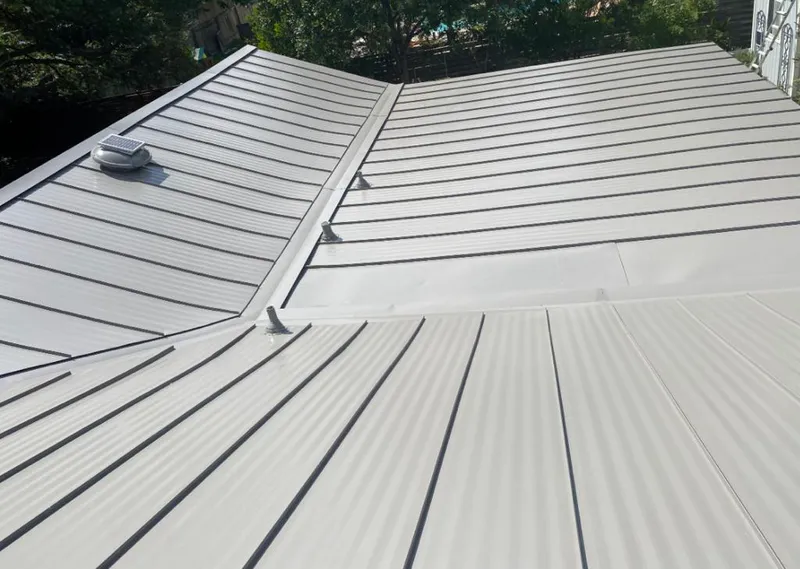 Solar attic fan installed on a metal roof for Roof Ventilation in Kaneohe